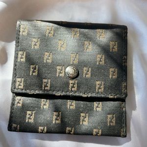 Vintage FENDI nano bag with a gold chain necklace